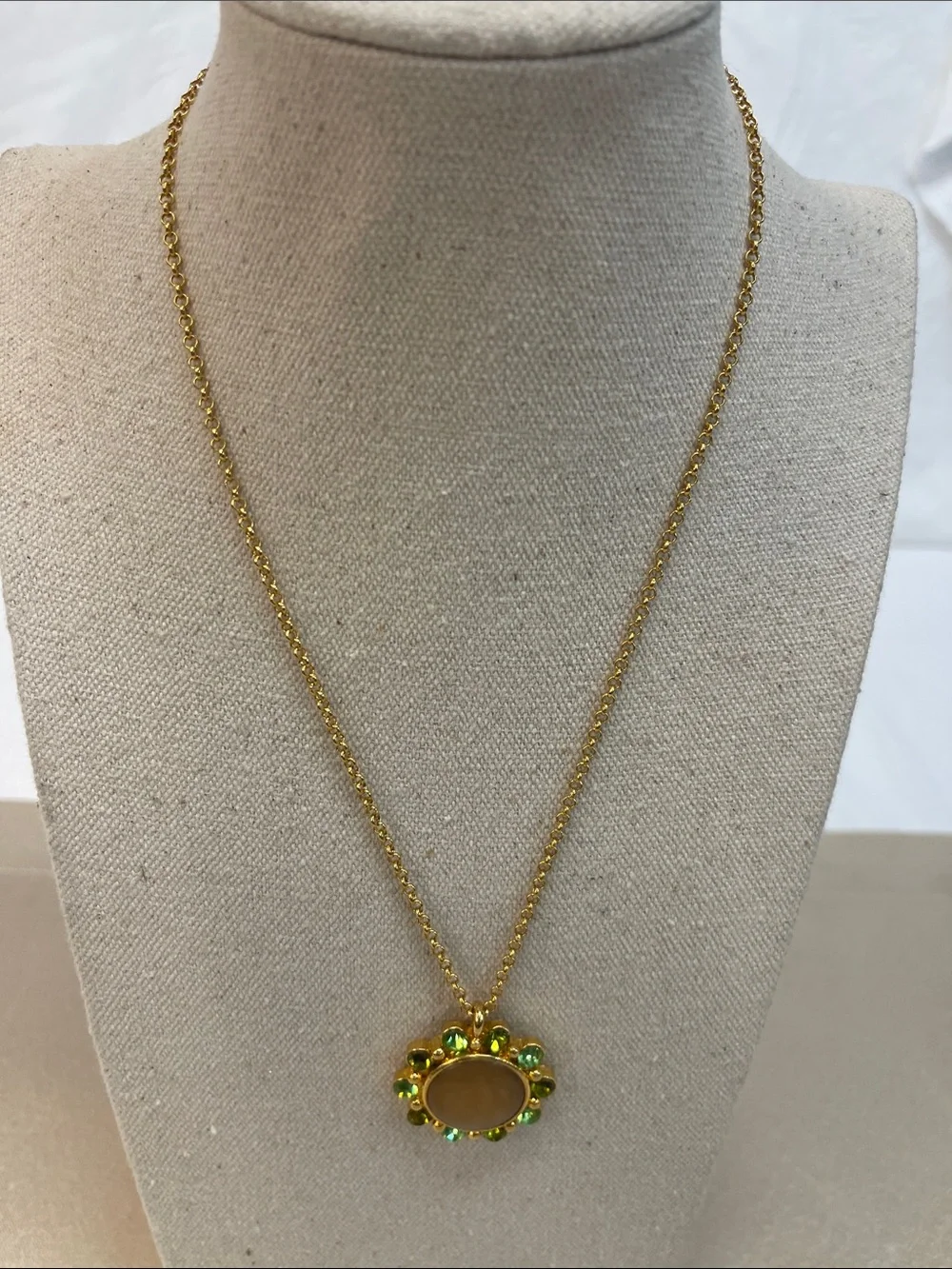 Gold-Tone Necklace with Beige Center and Green Crystal Halo